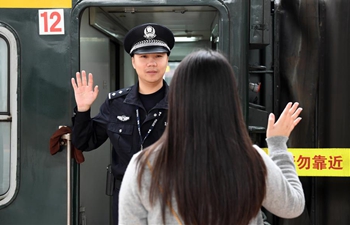 Pic story: newlywed train conductor remains on guard on Chinese New Year's Eve