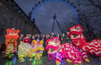London Eye lit up in red and gold to celebrate Chinese New Year