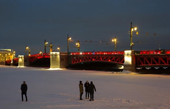 Russia's Palace Bridge lit in red lights to mark Chinese New Year