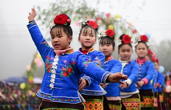 Miao people perform folk dance to celebrate Chinese Lunar New Year in China's Guizhou