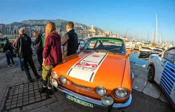 People attend vintage race car show in La Condamine, Monaco