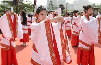 Students take part in traditional coming-of-age ceremony in NW China's Xi'an