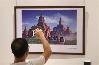 People visit photo exhibition titled "Our Silk Road" in Yangon, Myanmar