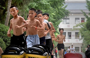 Pic story: Young learners practise Taiji in central China's Henan Province