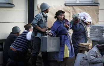 People take part in re-enactment of Warsaw Uprising in Poland