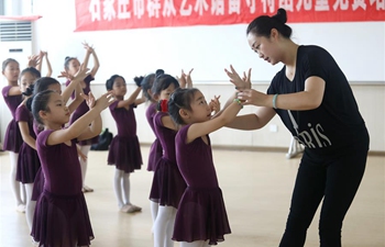 Children attend dancing class during summer vacation in north China's Hebei