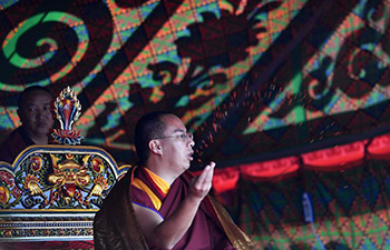11th Panchen Lama worships on bank of Nam Co Lake in China's Tibet