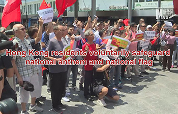 Hong Kong residents voluntarily safeguard national anthem and national flag