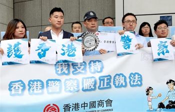 Members of Hong Kong China Chamber of Commerce express support for police
