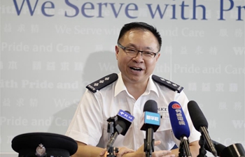 Feature: Video of police officer gently dissuading protesters from besieging police station goes viral