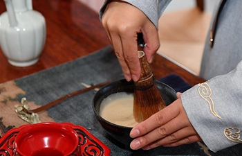 Traditional Chinese tea-boiling technique: "Dian Tea"