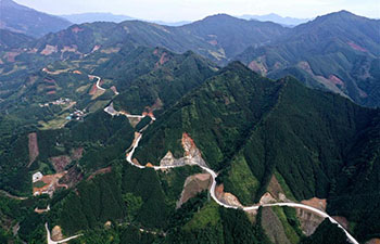Locals to benefit from road building as part of poverty alleviation efforts in China's Guangxi