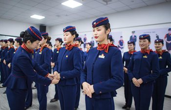 Stewardesses take part in training for Spring Festival travel rush in Wuhan