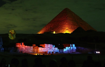 Feature: Egypt's Pyramids, Sphinx shine in red to mark Chinese New Year