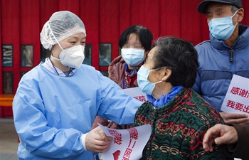 Recovered COVID-19 patients discharged from hospital in Wuhan