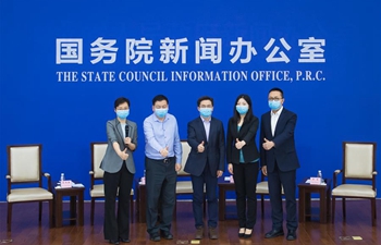 Frontline experts attend press conference in Wuhan