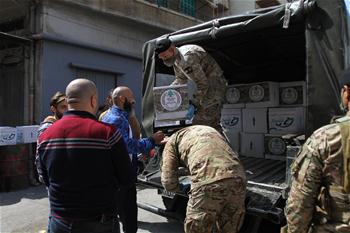Lebanese army distribute aid materials to poor families in Tripoli