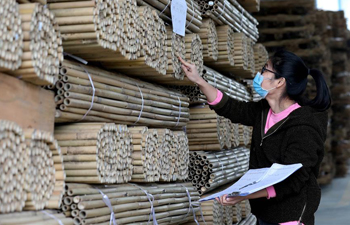Workers make bamboo products in Rongan County, S China