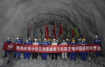 Key tunnel of China-Laos railway drilled through: constructor
