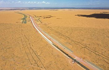 Wuhai-Maqin highway, first desert highway in NW China's Ningxia, under construction