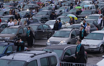 Drive-in graduation ceremony held by university in Latvia
