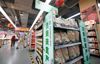 Supermarket set up under poverty relief program opens in Beijing
