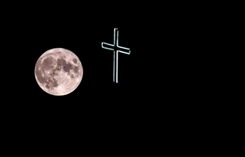Full moon rises over church in North Macedonia