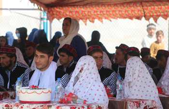 Afghan couples attend group wedding party in Shiberghan