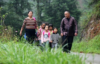 Pic story: Teacher couple dedicated to rural education in SW China's Guizhou