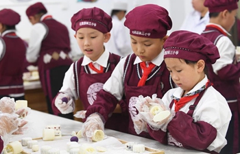 People make mooncakes for upcoming Mid-Autumn Festival