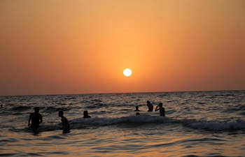 Palestinians enjoy their time at seaside in Gaza City