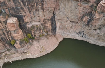 In pics: cliff road near Xiagou Reservoir in N China