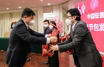 Chinese embassies, consulate generals distribute Spring Festival kits to local Chinese communities
