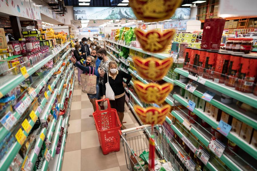People shop at supermarket in Chinatown in Buenos Aires
