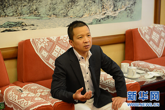 新华网专访聚信达控股有限公司董事长江远涛