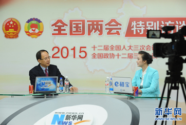 主持人对话嘉宾李潮东