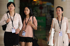 论坛上的美女记者和志愿者