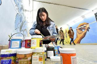 創意墻畫扮靚校園