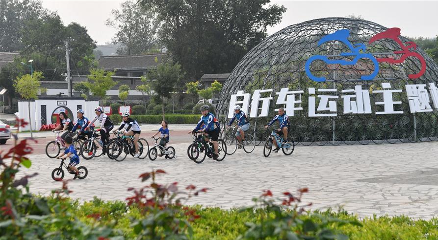 小山村办起“骑行俱乐部”——乡村变富变美带来的新鲜事