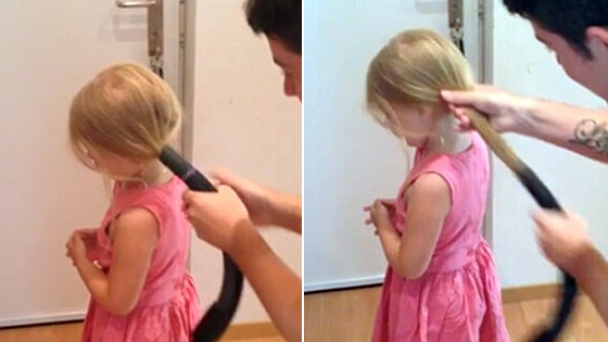 奥“天才”父亲用真空吸尘器为女儿梳头