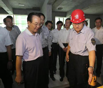 温家宝:投入市场、群众满意是衡量保障性安居工程进展好坏最重要的标准
