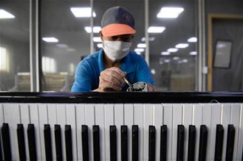 探访“中国钢琴之乡”