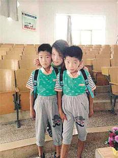 女研究生3年打工助养一对双胞胎 每月资助900元