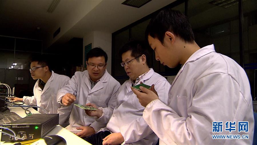 (图文互动)让五星红旗飘扬在世界“超算”之巅——记国防科大计算机学院院长廖湘科