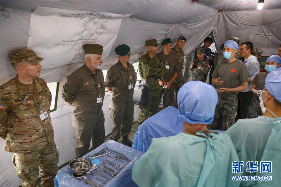 (国际)(2)多国军官观摩中德“联合救援-2019”卫勤实兵联合演习