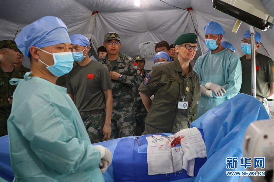 (国际)(3)多国军官观摩中德“联合救援-2019”卫勤实兵联合演习