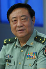 周国泰：军装折射出的历史跨越