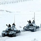 新疆軍區大動作 坦克涂新偽裝色成群出動