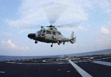 PLA escort fleet conducts flight training for shipboard helicopters