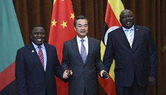 Chinese FM talks with Zambia's FM, Uganda's Acting FM in Beijing